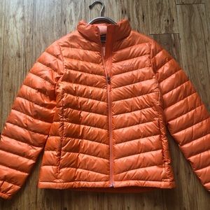 Women’s Marmot down jacket.